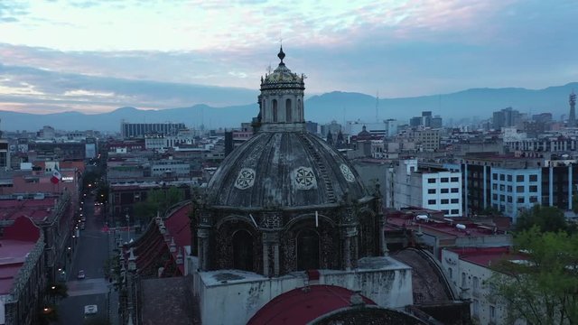 Aerial shot of a Colonial Mexico City center Church at dawn.