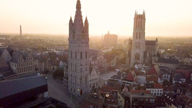Pan Up shot of Old Bell Tower. Aerial shot Het Belfort Van Gent, Ghent, Belgium