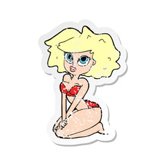 retro distressed sticker of a cartoon woman wearing bikini