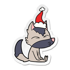 sticker cartoon of a wolf whistling wearing santa hat