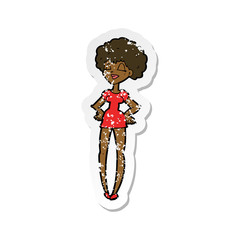 retro distressed sticker of a cartoon happy woman with hands on hips