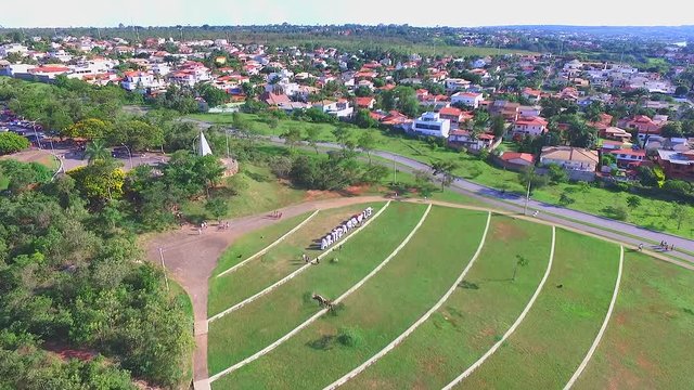 Drone / aerial footage above Brasilia's lake (Ermida Dom Bosco), Brazil capital's - summer season.