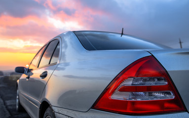 Fototapeta na wymiar car in sunset