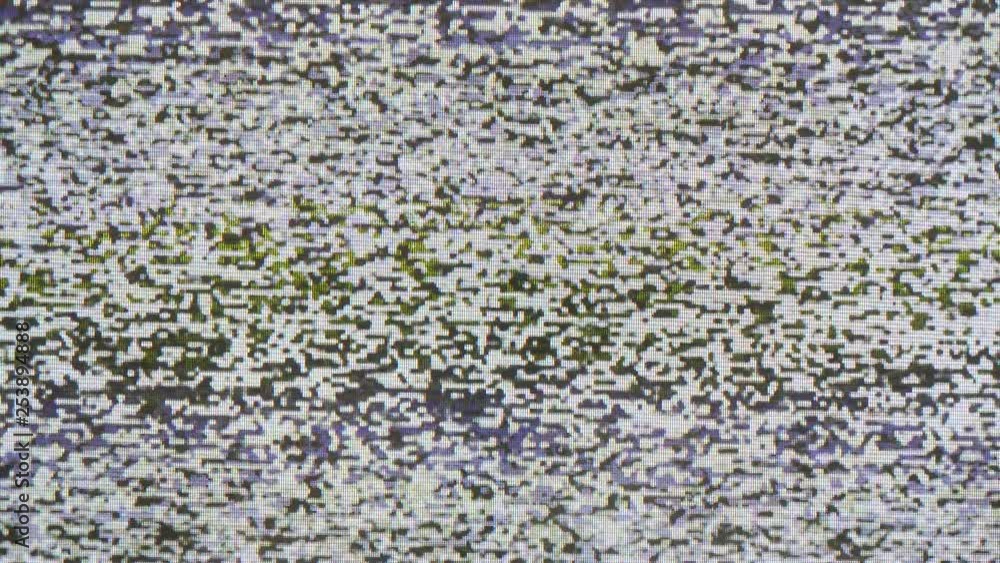 Poster close-up shot of loopable analog television static from an old tv screen.