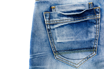 The texture of blue frayed jeans with a pocket on the isolate .Denim background