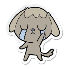 sticker of a cute cartoon dog crying