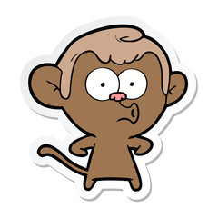 sticker of a cartoon hooting monkey