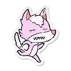 distressed sticker of a cartoon wolf running showing teeth