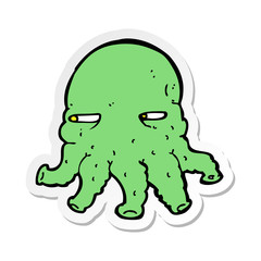 sticker of a cartoon alien face