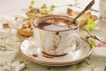 Hot chocolate with marshmallow and bruschetta or crostini.