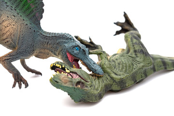 spinosaurus biting tyrannosaurus on a white background
