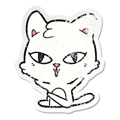 distressed sticker of a cartoon cat