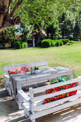 Image of Empty table in the house's garden.