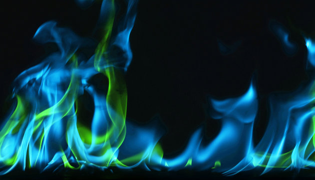 Multi Color Fire Flame Abstract on black background. A mystic colorful smoke. Blurry bright abstraction with colored lines. Magic fire - texture Image