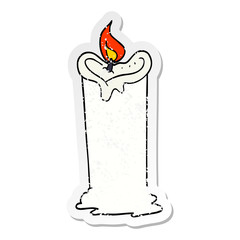distressed sticker of a cartoon candle
