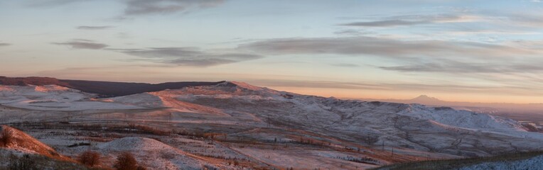 Panorama of winter mountains in Caucasus region