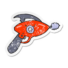distressed sticker of a cartoon ray gun
