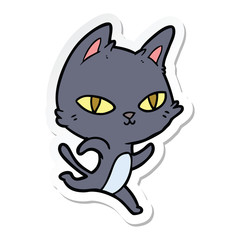 sticker of a cartoon cat staring