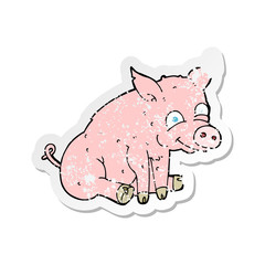 retro distressed sticker of a cartoon happy pig