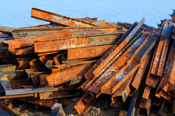 Rusty steel metal bars. Scrap-iron. Concept of scrap metal.