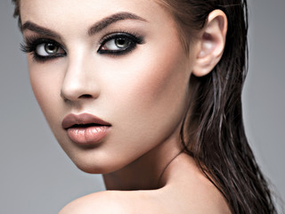 Fototapeta premium Beauty face of the young beautiful woman
