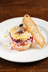 salad with herring and vegetables