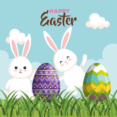 happy rabbits with easter eggs decoration