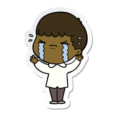 sticker of a cartoon man crying
