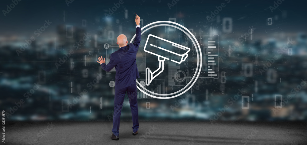 Poster businessman in front of a wall with security camera system icon and statistics data - 3d rendering
