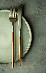 Spring table setting with blooming tree branch