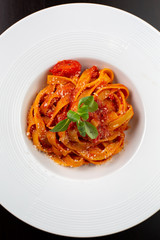 pasta with tomato sauce and basil