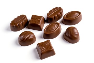 Obraz na płótnie Canvas Chocolate candies on a white background