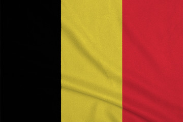 Obraz premium Flag of the Belgium from the factory knitted fabric. Backgrounds and Textures