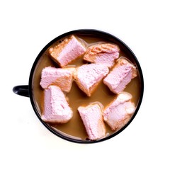 Coffee with milk and marshmallow in a dark cup