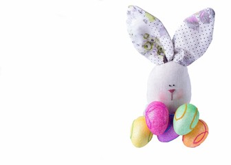 Easter bunny with eggs on a white background with a place for an inscription.