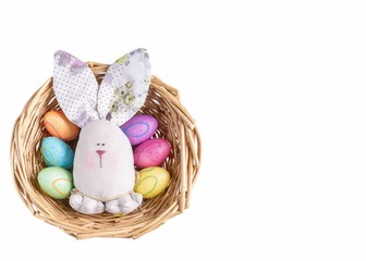 Easter bunny with eggs on a white background with a place for an inscription.