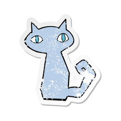 retro distressed sticker of a cartoon cat