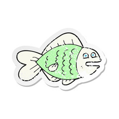 retro distressed sticker of a cartoon funny fish