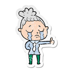 Obraz premium distressed sticker of a cartoon crying businesswoman