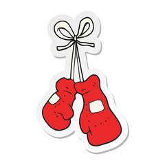 sticker of a cartoon boxing gloves