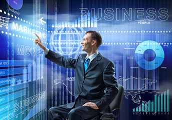 Businessman using media interface