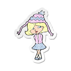 retro distressed sticker of a cartoon happy girl wearing hat