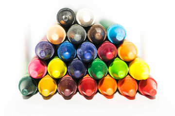 Multi color pastel used for drawing and stacked to form a pyramid
