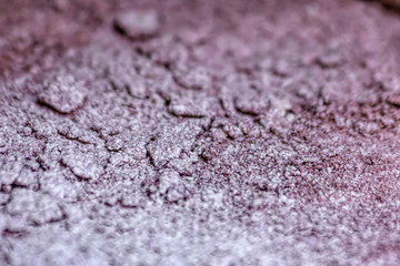 Closeup inspection of mud, clay, earth.