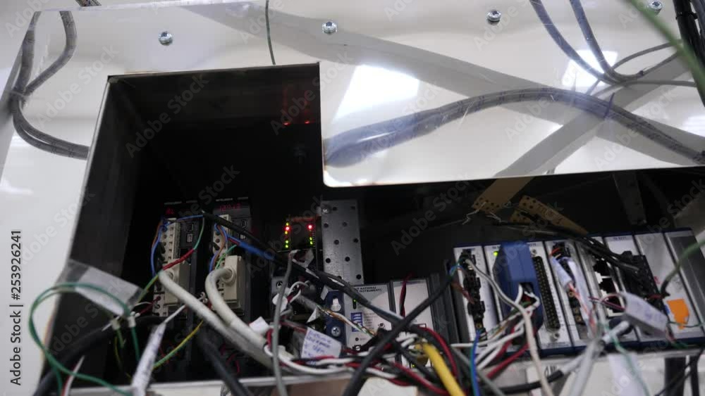 Poster close-up of wire of machine. electrical panel with fuses and contactors. internal cables with counte