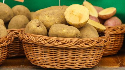 Fototapeta na wymiar Potatoes in wicker basket