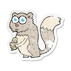 retro distressed sticker of a cartoon angry squirrel with nut