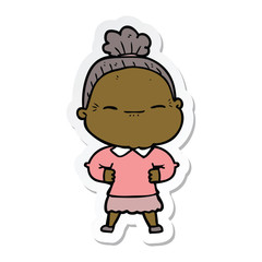 sticker of a cartoon peaceful old woman