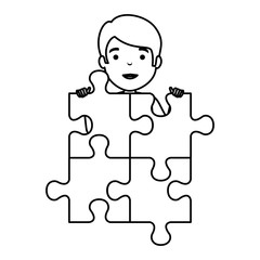 young boy with puzzle attached