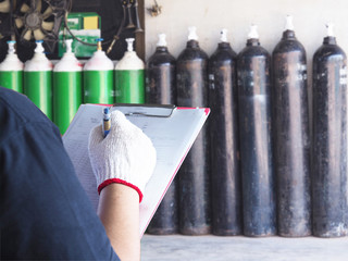  Female technician check Oxygen tank industry